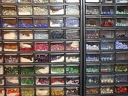 Drawers of beads line the walls of the LongLocks studio