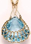 Blue Topaz and Crocheted Gold Pendant